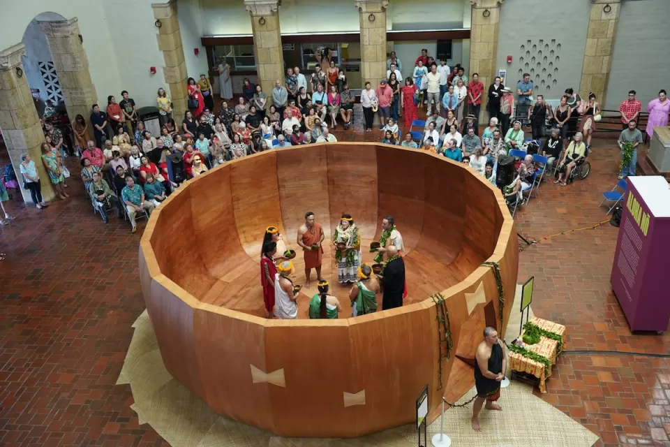 ‘Umeke Lā‘au: Culture Medicine art installation - giant wooden sculpture of calabash with people standing inside.